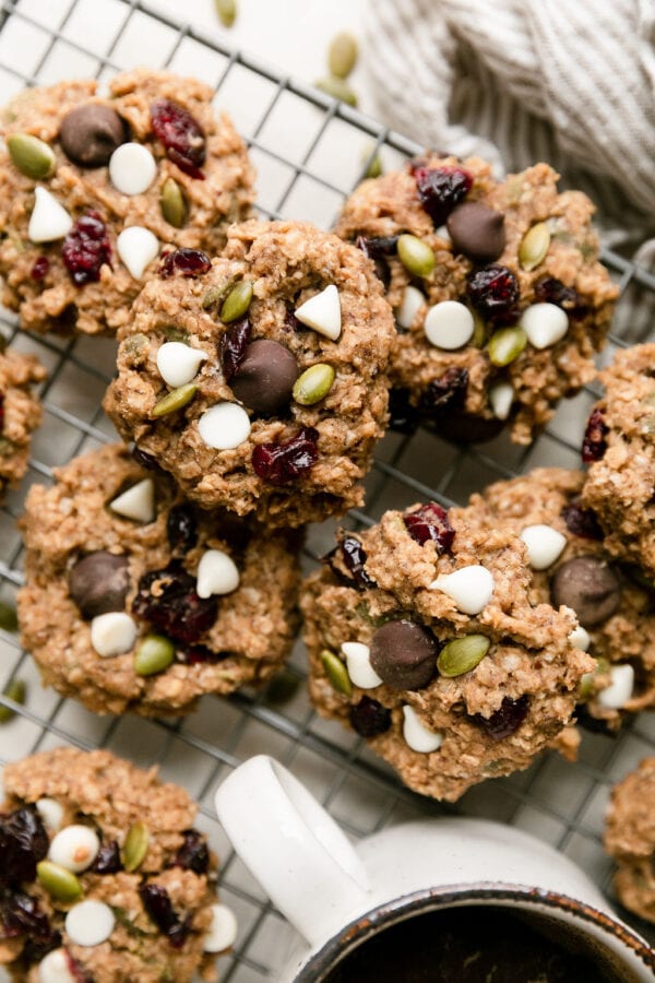 an overhead view of freshly made trail mix breakfast cookies on a cooling rack.
