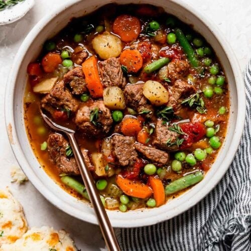 Stone bowl filled with vegetable beef soup