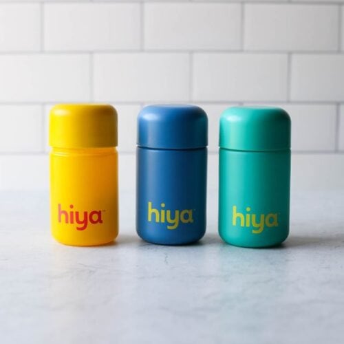 Three colorful bottles of Hiya Kids Multivitamins against a white background