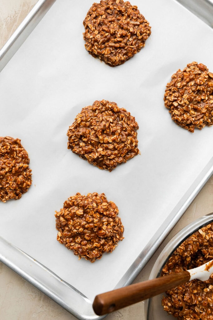 Overhead view of chai spice protein breakfast cookies on a sheet pan.