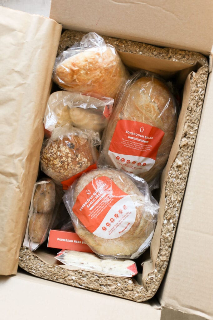 Overhead view of a box of sourdough baking products. 