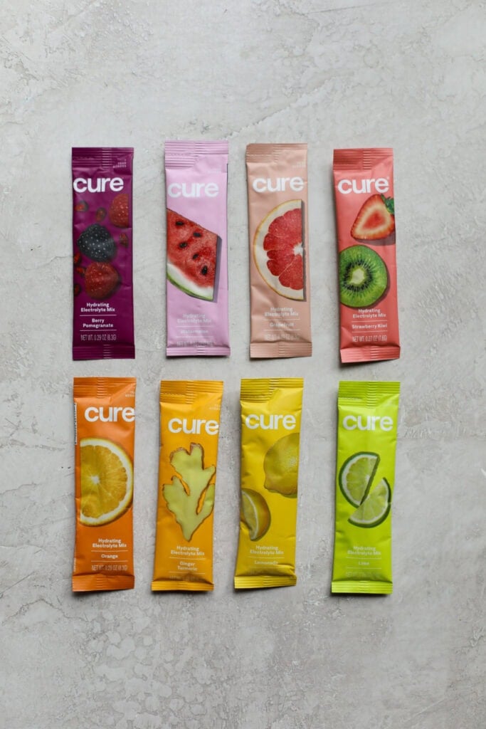 A colorful variety of cure hydrating electrolyte mix packets. 
