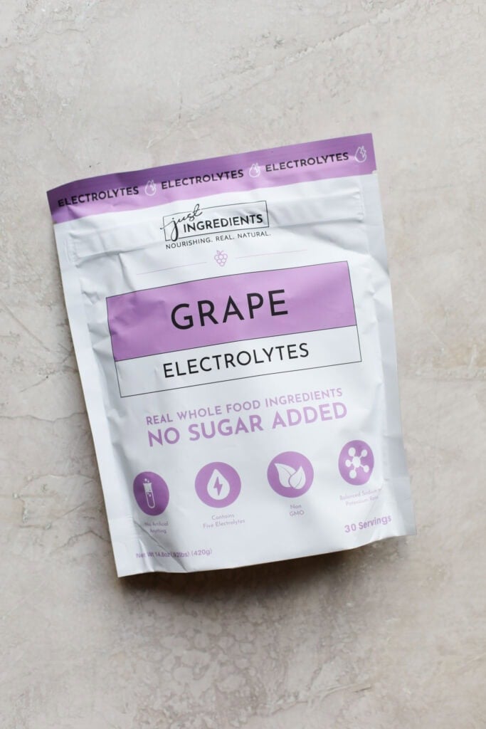 A bag of Just Ingredients brand grape electrolyte drink mix. 