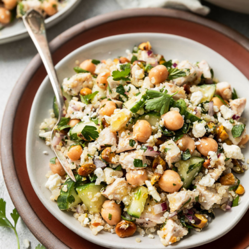 Jennifer Aniston salad with chicken and chickpeas in white serving bowl