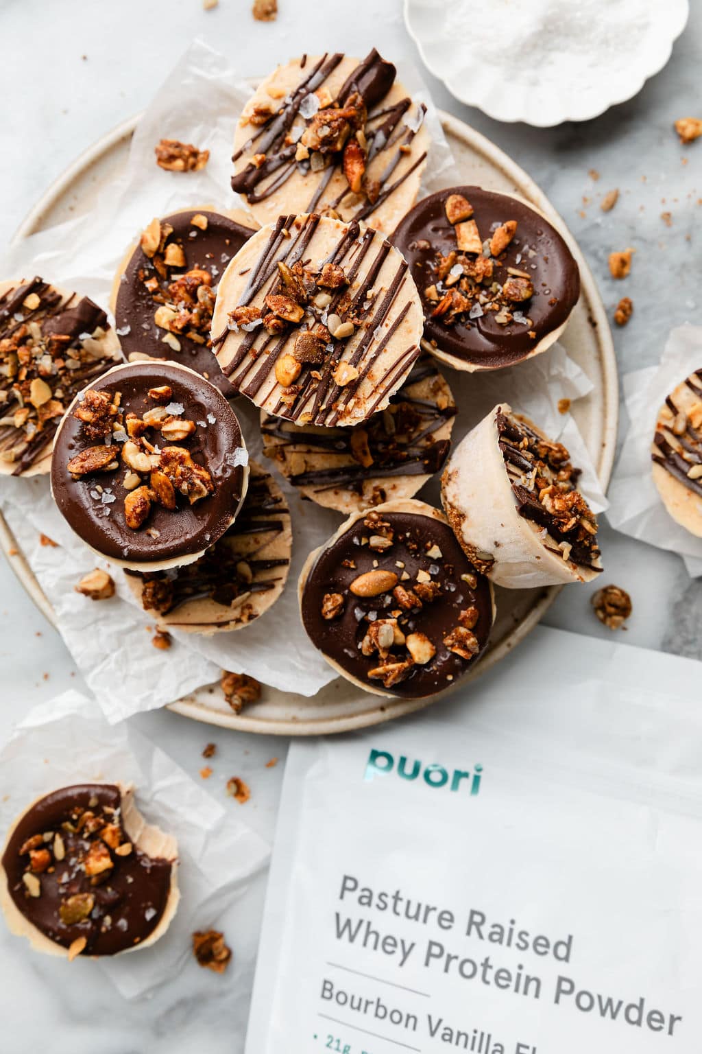 Overhead view of a plate filled with Delicious Frozen Yogurt Peanut Butter Cups.