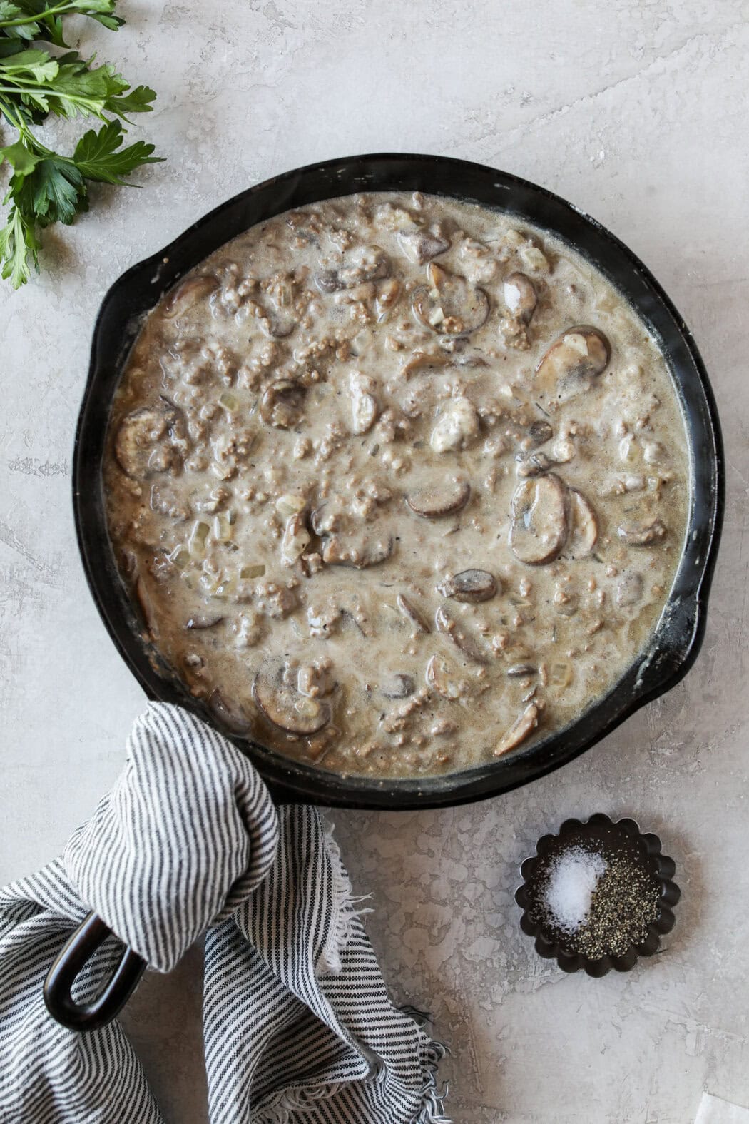 Overhead view of a freshly cooked pan of ground beef stroganoff ready for noodles to be added. 