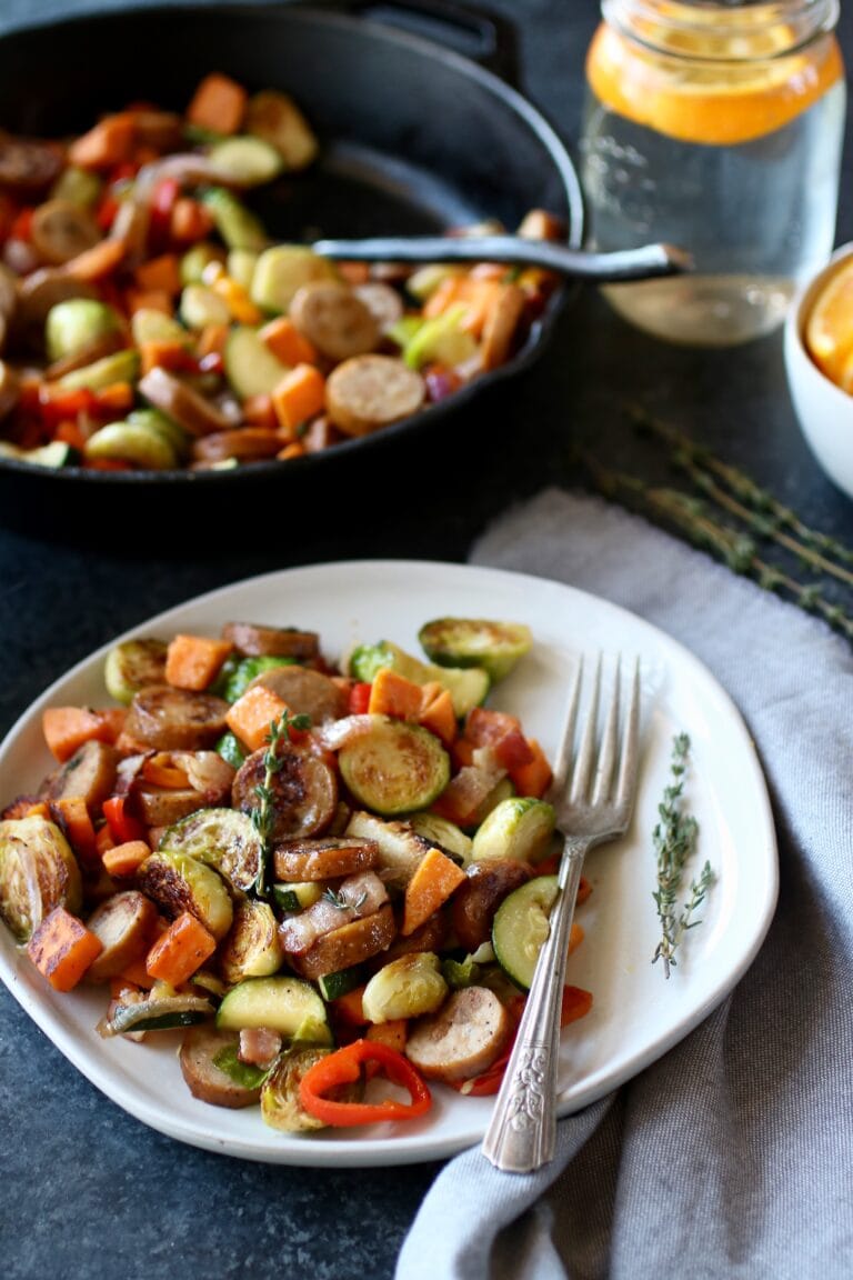 A plate of chicken and apple sausage sweet potato hash