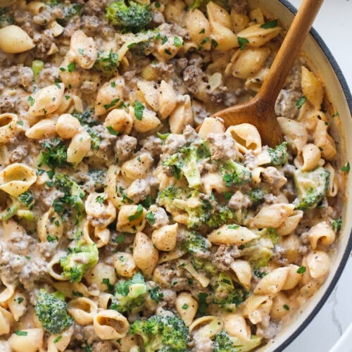 Overhead view hamburger helper with broccoli in skillet