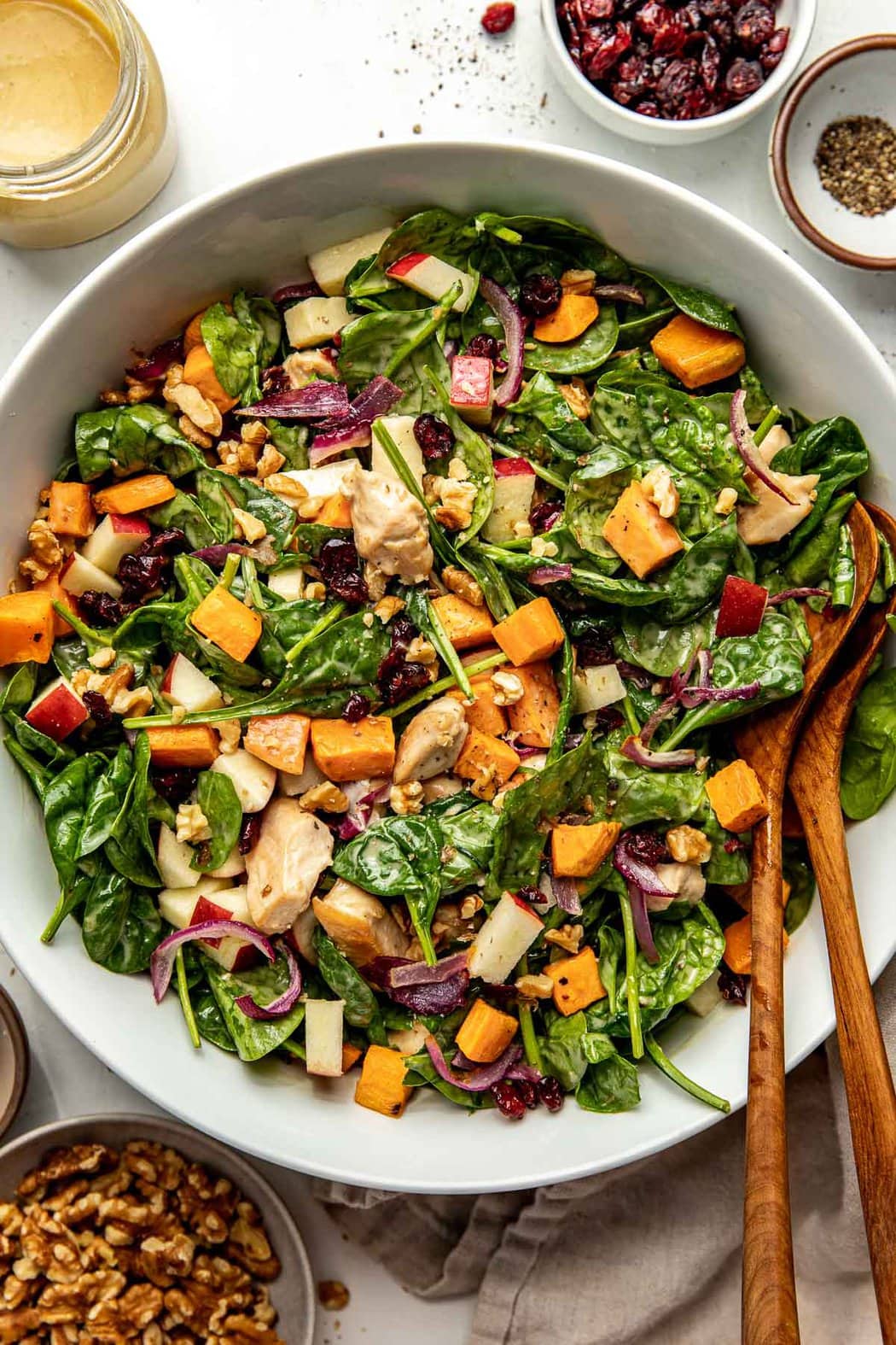 Overhead view of a bowl filled with Harvest Chicken Salad With Maple Dijon Dressing. 