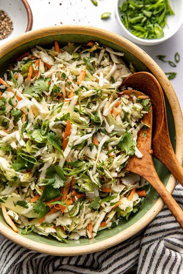 Overhead view of Cilantro Lime Slaw in a wood bowl.