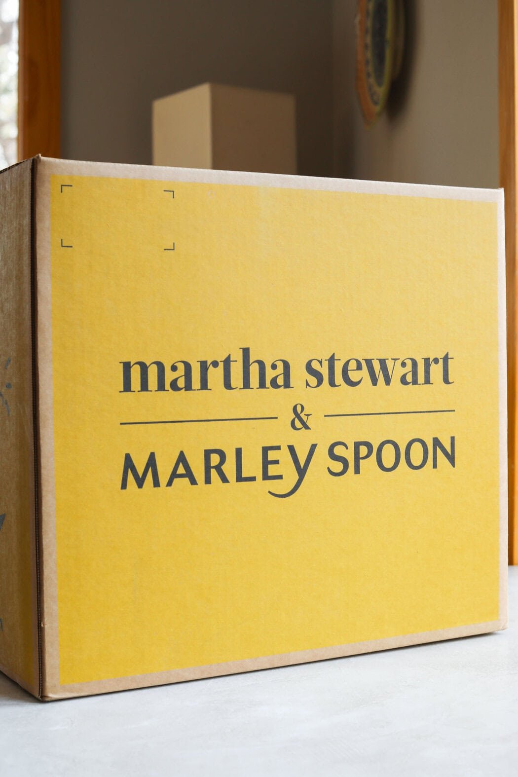 Close up view of a Marley Spoon food delivery box. 