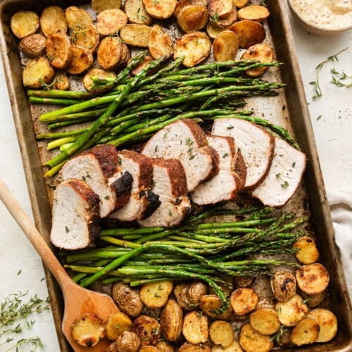 Sheet Pan Pork Tenderloin with roasted potatoes and asparagus.