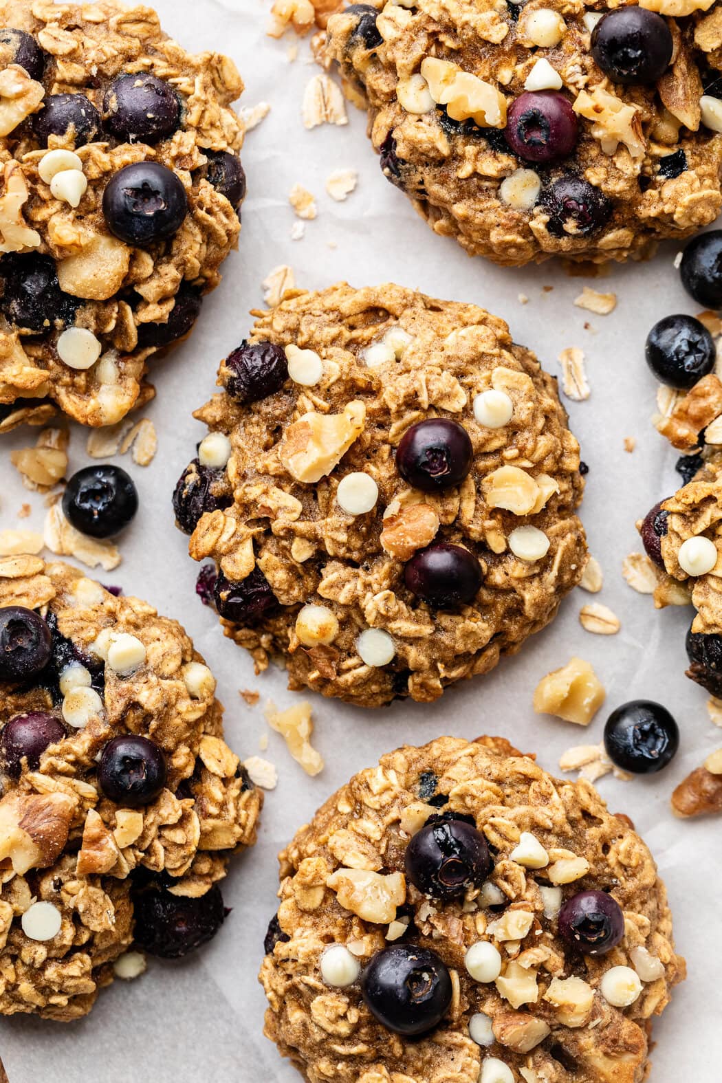 Close up view of Blueberry Oatmeal Breakfast Cookies to show the chewy texture and melty mini white chocolate chips.