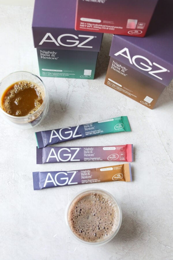 Overhead view of a variety of packets and boxes of AGZ nightly drink mix.