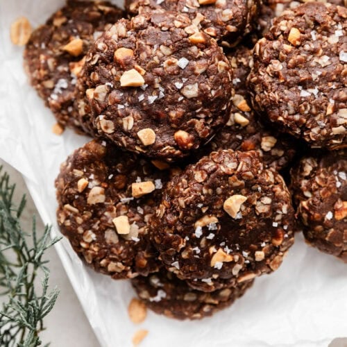 Overhead view of a plate of No Bake Cookies topped with flakey sea salt.