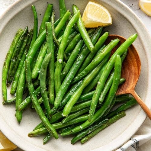 Overhead view of a bowl of Sautéed Green Beans.
