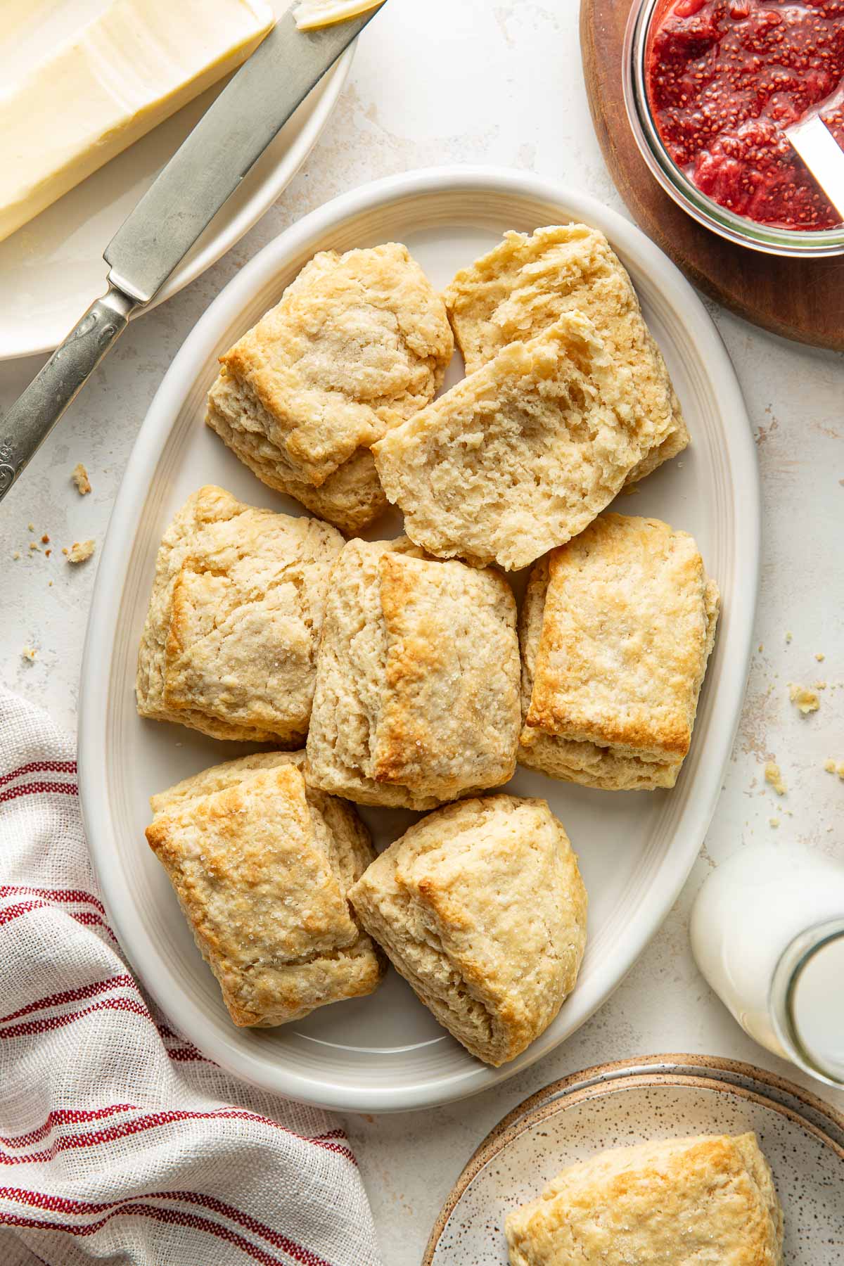 Overhead view of an oval platter filled with Sweet Cream Biscuits