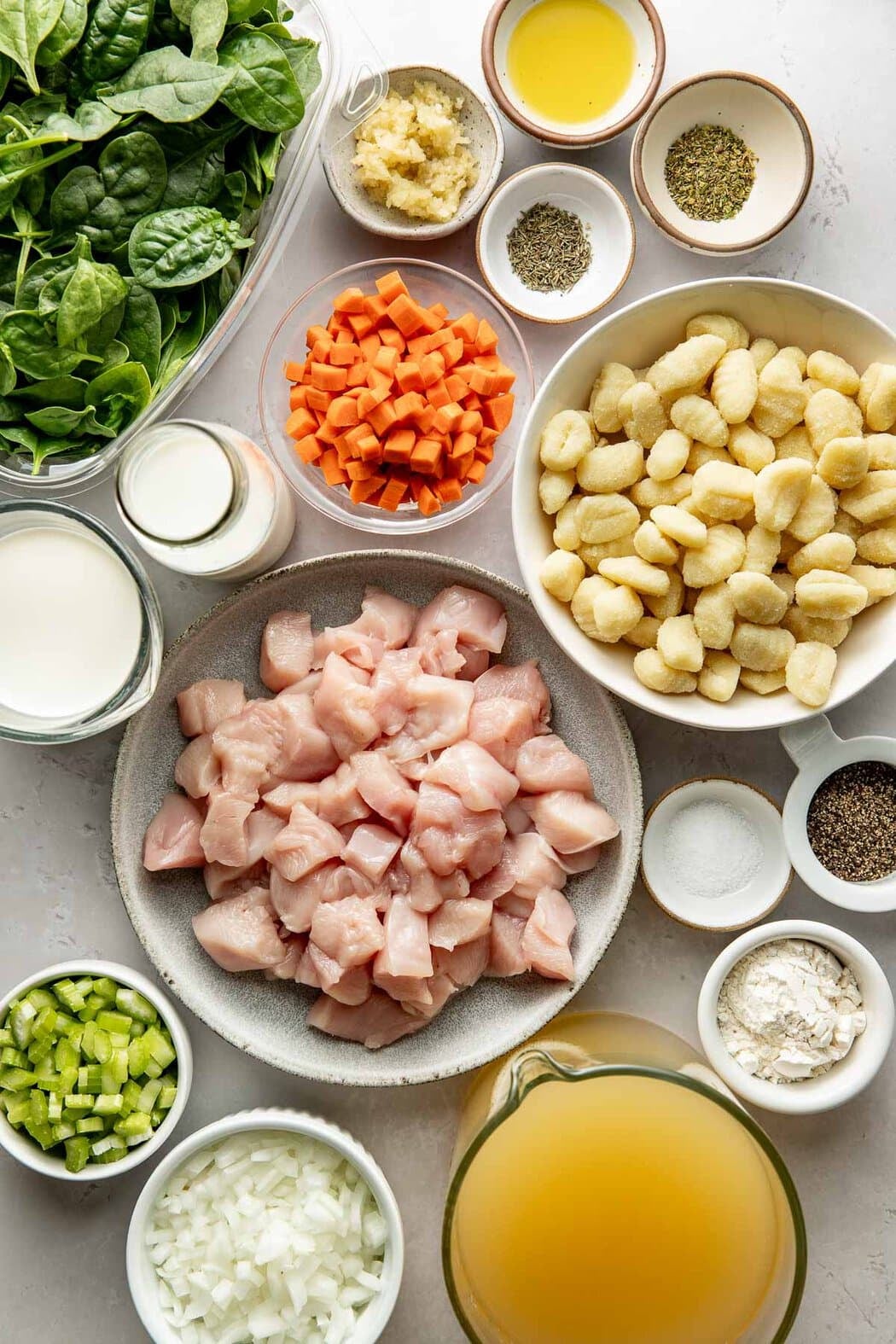 Ingredients to make creamy chicken gnocchi soup.