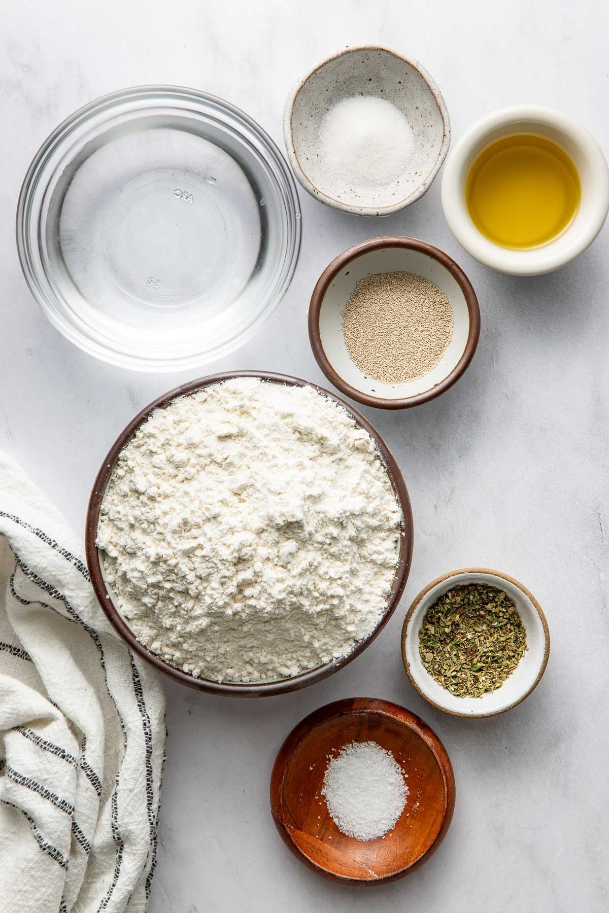 Ingredients to make homemade pizza dough.