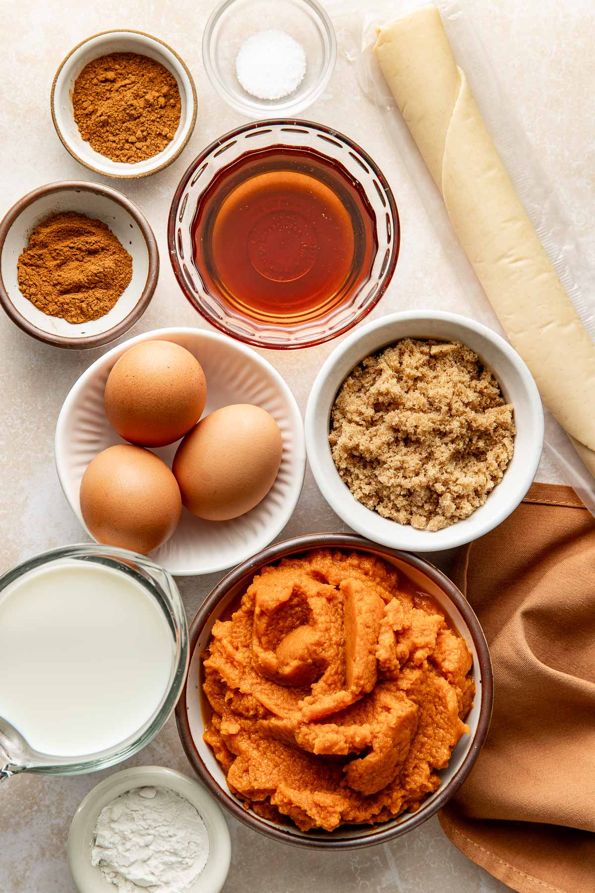 Ingredients to make pumpkin pie.